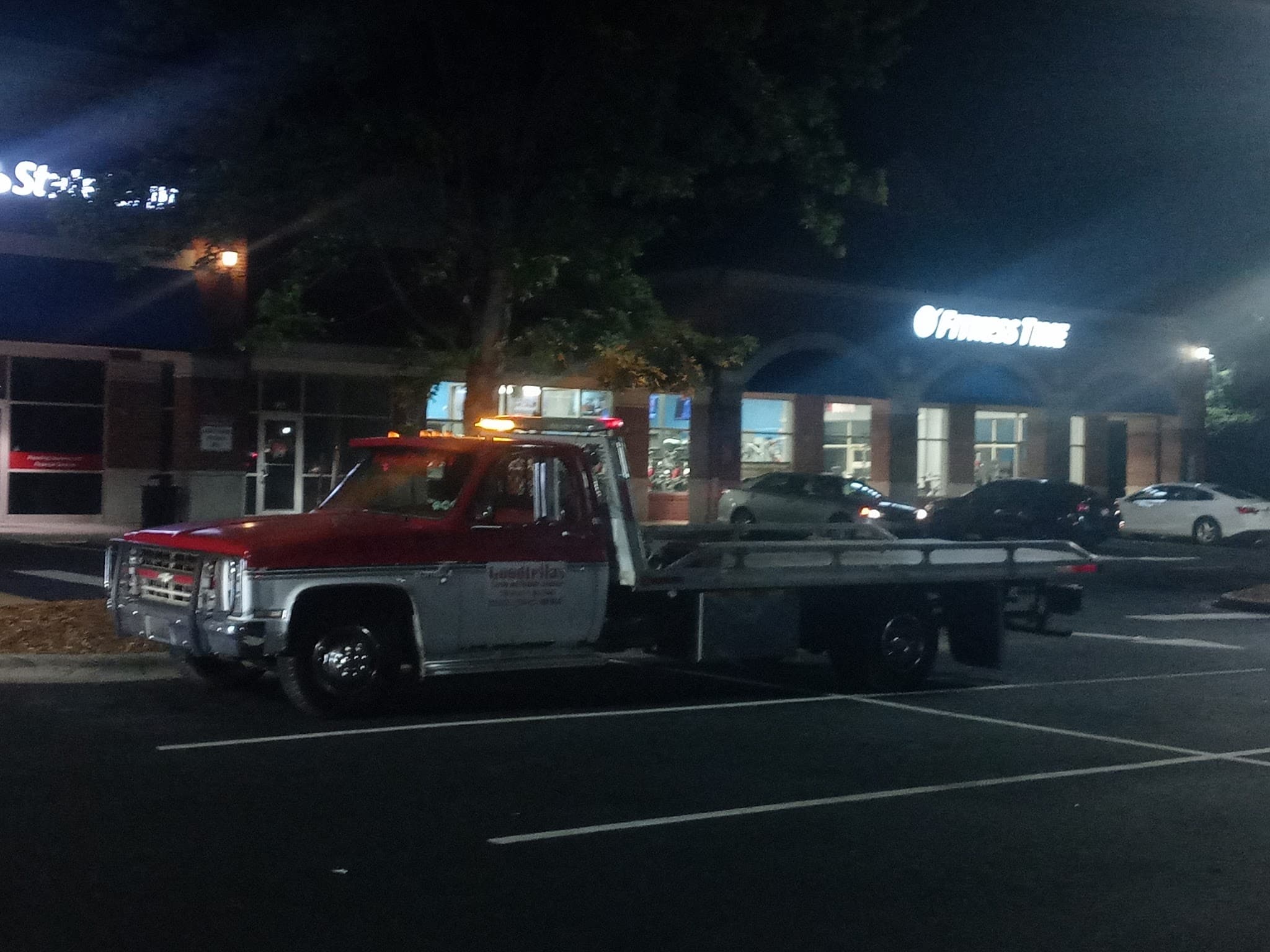 Goodfellas Towing flatbed staged in the Charlotte metro service area